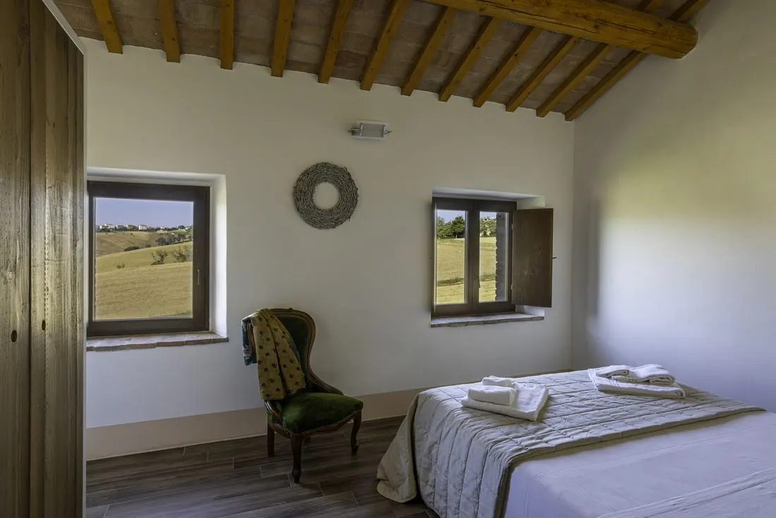 Double bedroom with views of the hills